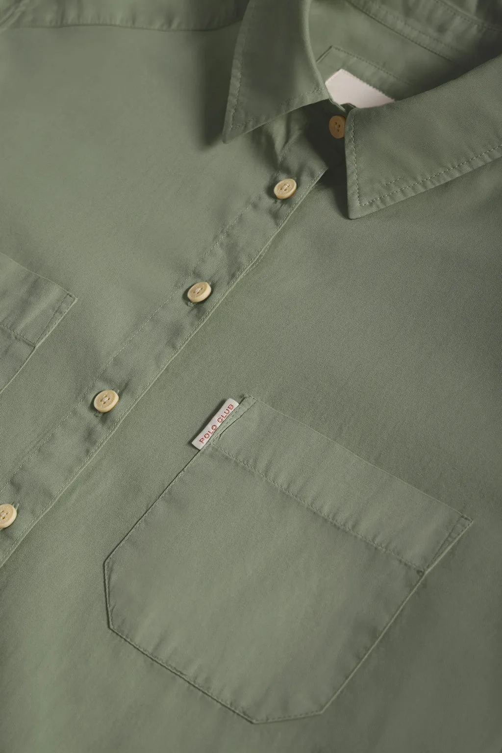 Camisa loose fit color verde con bolsillos y detalle Polo Club