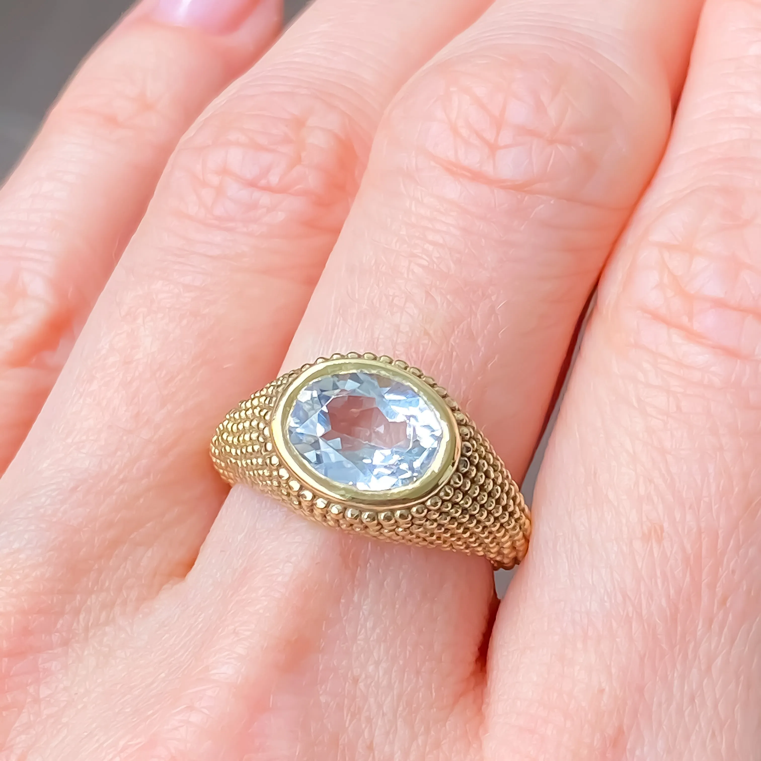 Nubia Oval White Topaz Yellow Gold Ring Size 7US