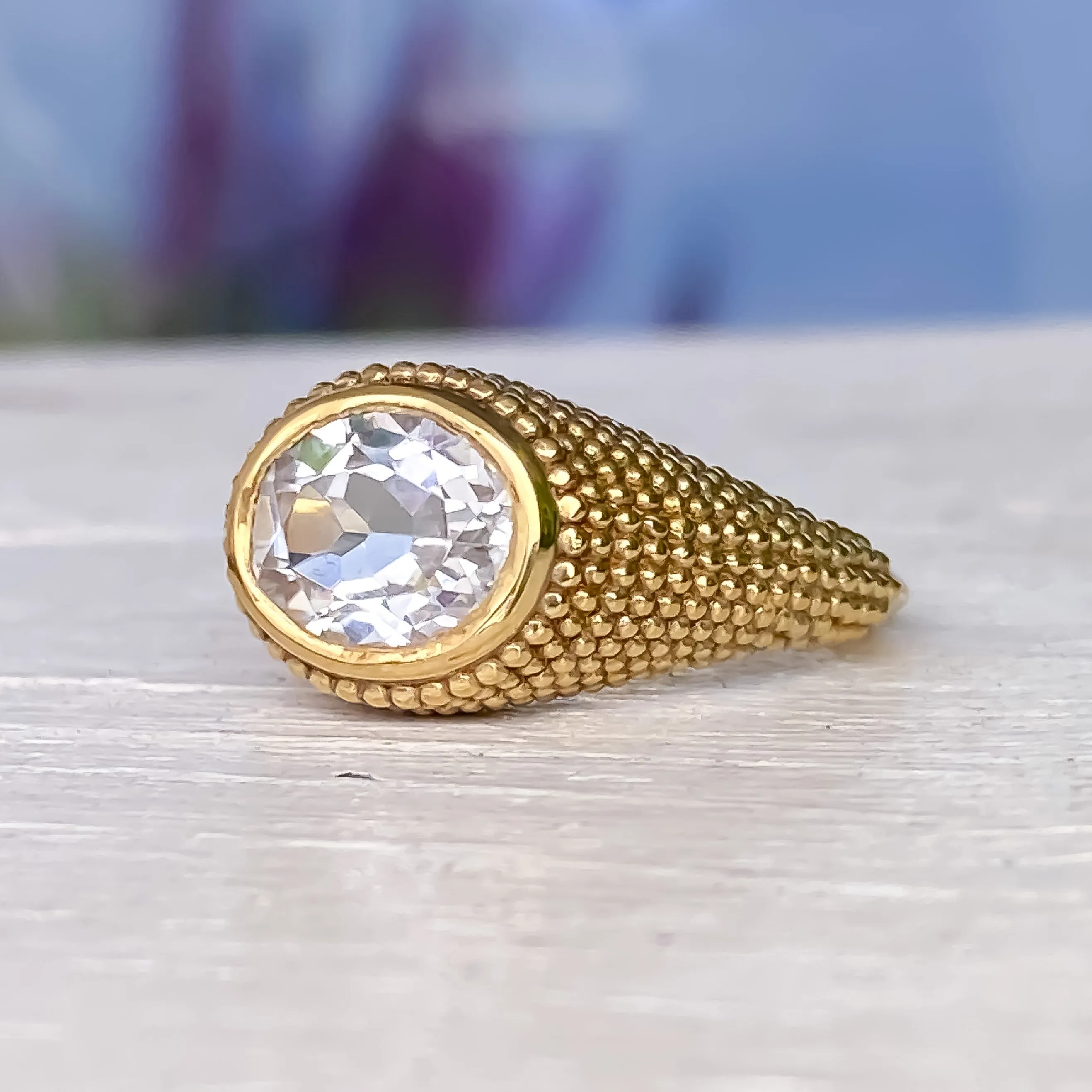 Nubia Oval White Topaz Yellow Gold Ring Size 7US